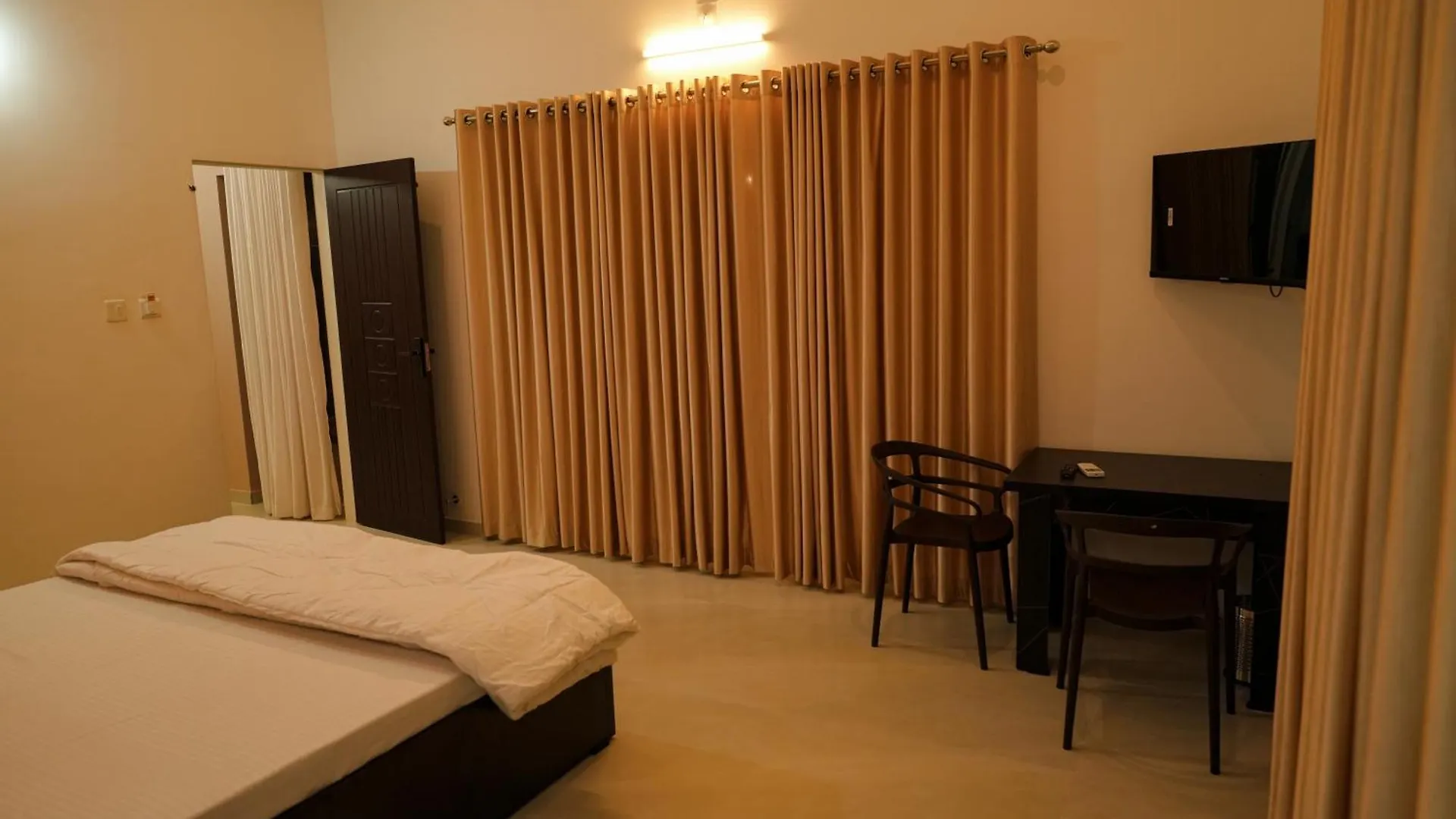 펜션 The Calm County Homestay 마난타바디